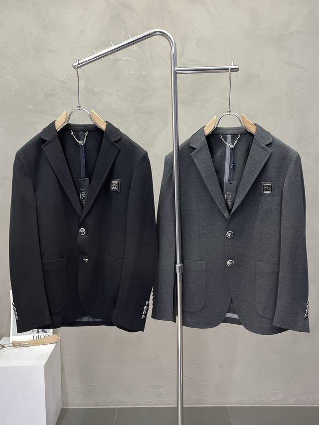 New Zegna suit. This simple, casual blazer is made exclusively from imported, g