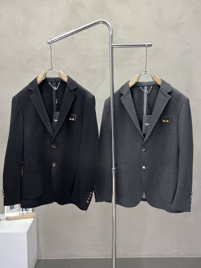 Fendi's new suit. This simple, casual blazer is made exclusively from imported,