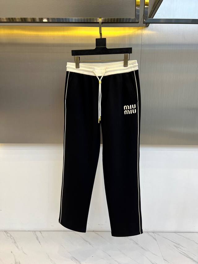 Miumiu, Fall/Winter 2025, new men's wool blend casual track pants. These track p