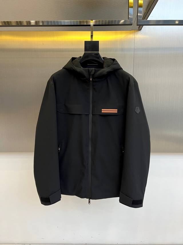 Zegna's goose down, new black hooded jacket for Fall/Winter 2025 showcases a mod