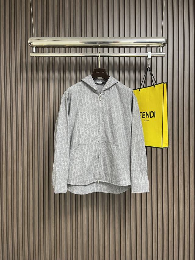 Dior Hooded Zip-Up Jacket. This hooded zip-up jacket features an all-over Obliqu