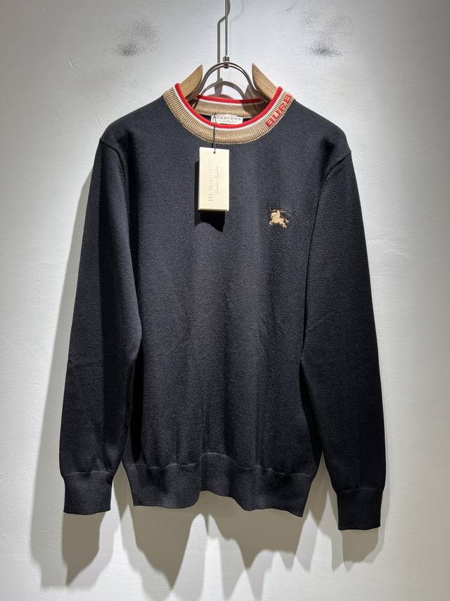 Bur*Erry's new autumn/winter 2025 knitted wool sweater features an embroidered l