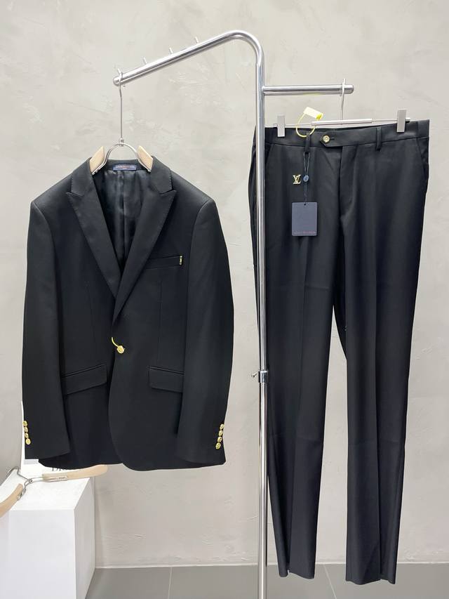 suit. Single-breasted jacket and trousers. Louis Vuitton's new spring/autumn su