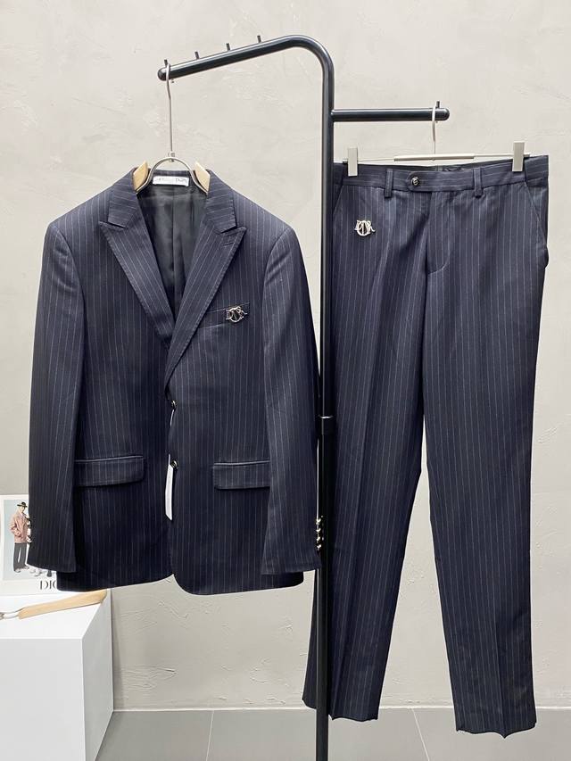 suit. Single-breasted jacket and trousers. Dior's new spring/autumn suit, a sim