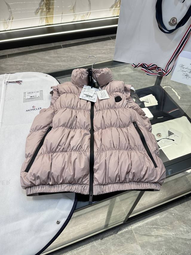 Moncler Apriate women's logo down vest. More details. Bll