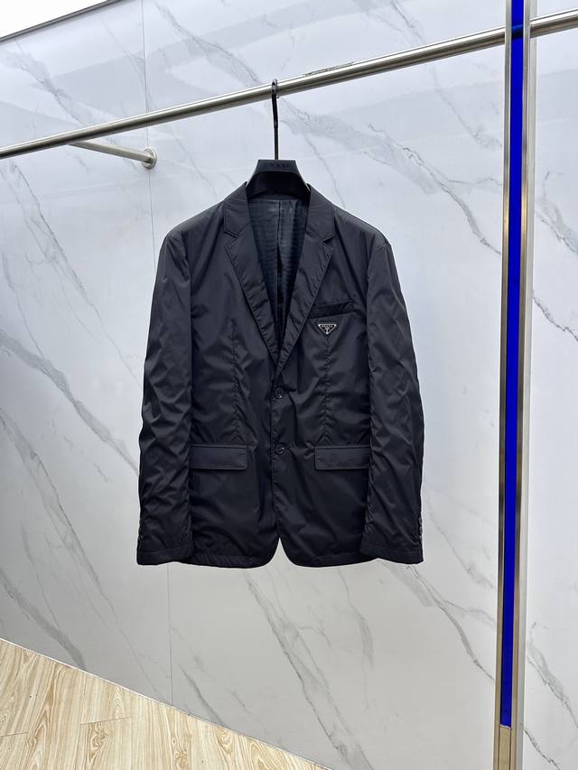 prada* Prada's 2025 Early Fall collection releases a Prada blazer. This autumn's
