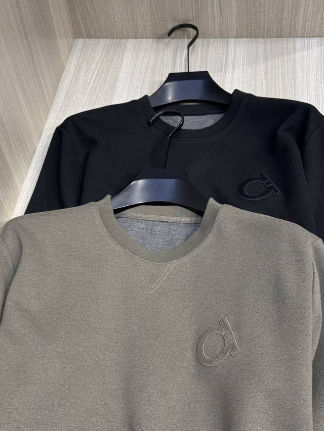 This Fila men's cashmere crewneck sweatshirt, available with matching sweatpant
