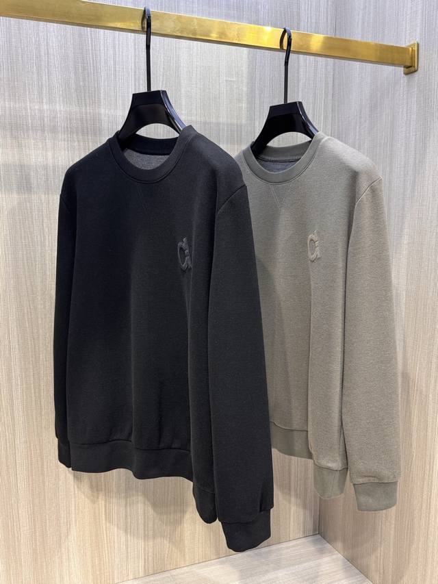 This Fila men's cashmere crewneck sweatshirt, featuring a matching hoodie, is a