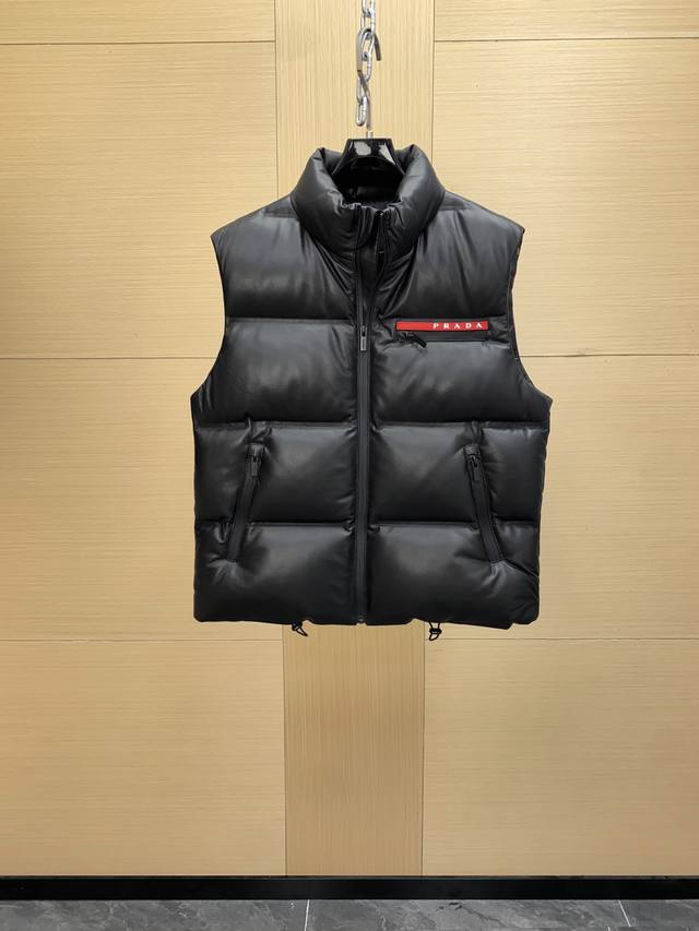Prada's must-have sheepskin down vest for fall and winter. . This is another h