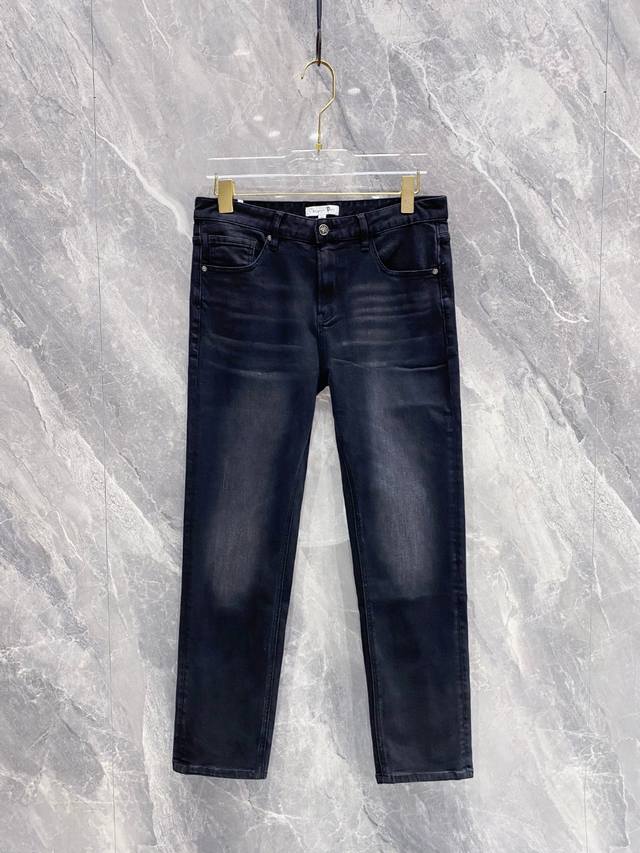 Dior's embossed logo slim straight-leg washed black denim, now available at Dior