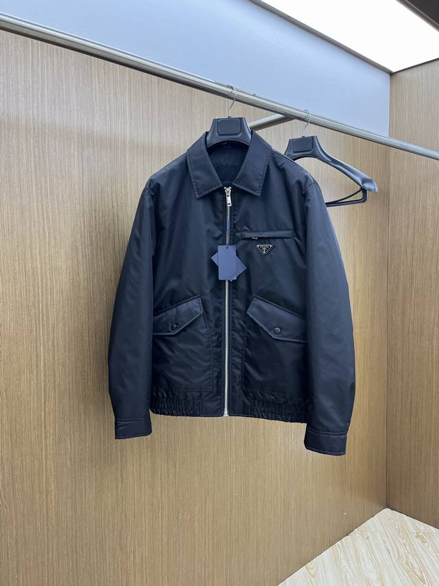Fall/Winter pd 2540Ss Early Fall New Release: Prada's Lapel Padded Jacket. This