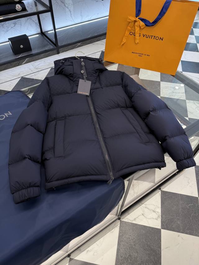 Louis Vuitton's new Monogram patchwork 3D jacquard hooded down jacket with detac
