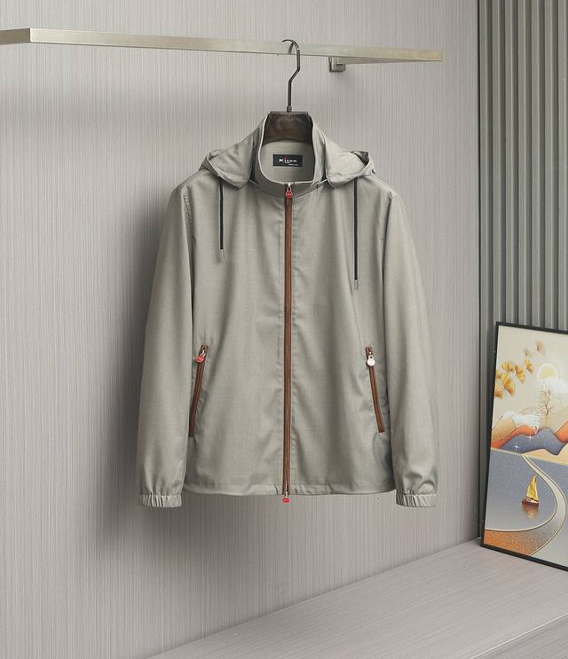 A fusion of classic and innovative, the Kiton stand-up collar hooded jacket. Kit