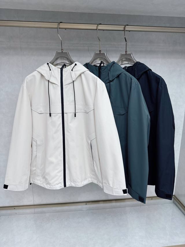 Zegna Early Fall 2025, the latest designer Zegna trench coat. Detailed and craf