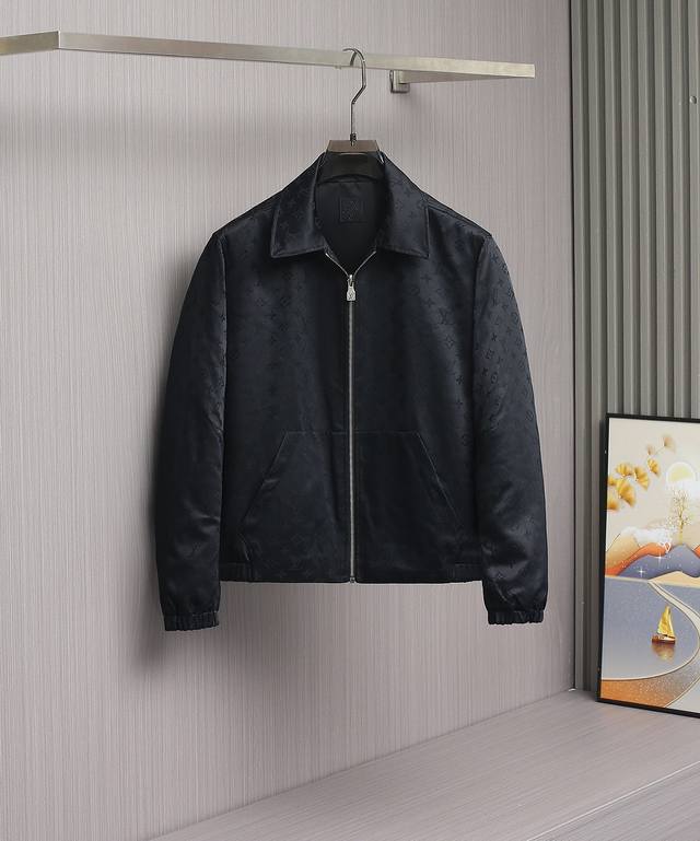 Louis Vuitton's new 2025 double-faced jacket, Lv. This jacket features a classic