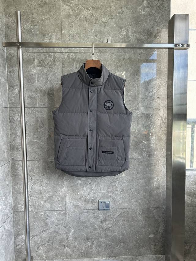 E20 4154M Freestyle Men's Down Vest. Color: Gray with Black Label. Bll Sizes: S