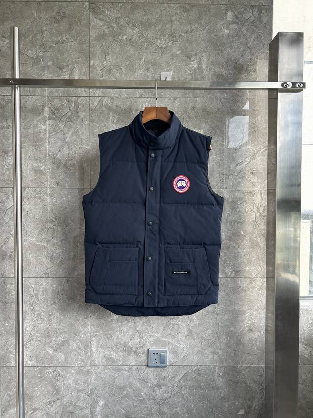 E20 4154M Freestyle Men's Down Vest. Bll Color: Dark Blue with Red Label. Sizes: