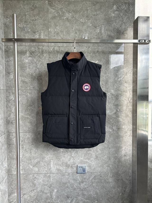 E20 4154M Freestyle Men's Down Vest. Bll Color: Black with Red Label. Sizes: S M