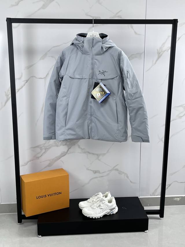 2025 Arcteryx's premium men's and women's down jacket with detachable hood. Maca