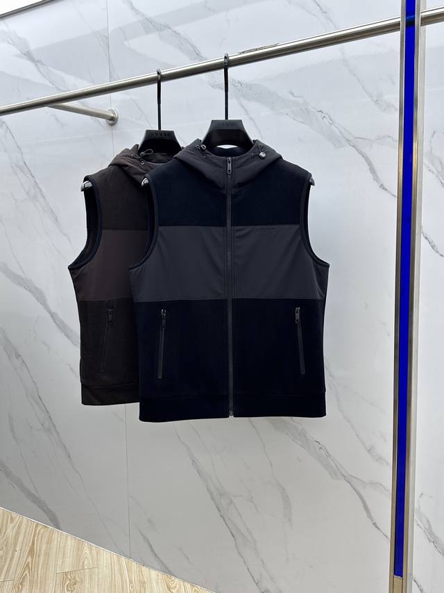 Zegna* Zegna's 2025 Early Fall collection features a hooded Zegna vest. This aut