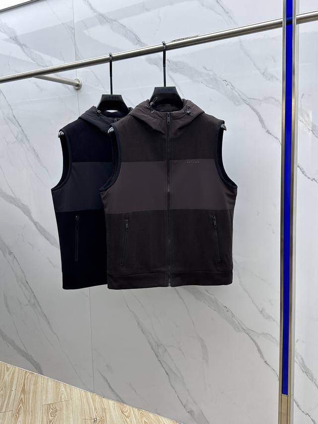 Zegna* Zegna's 2025 Early Fall collection features a hooded Zegna vest. This aut
