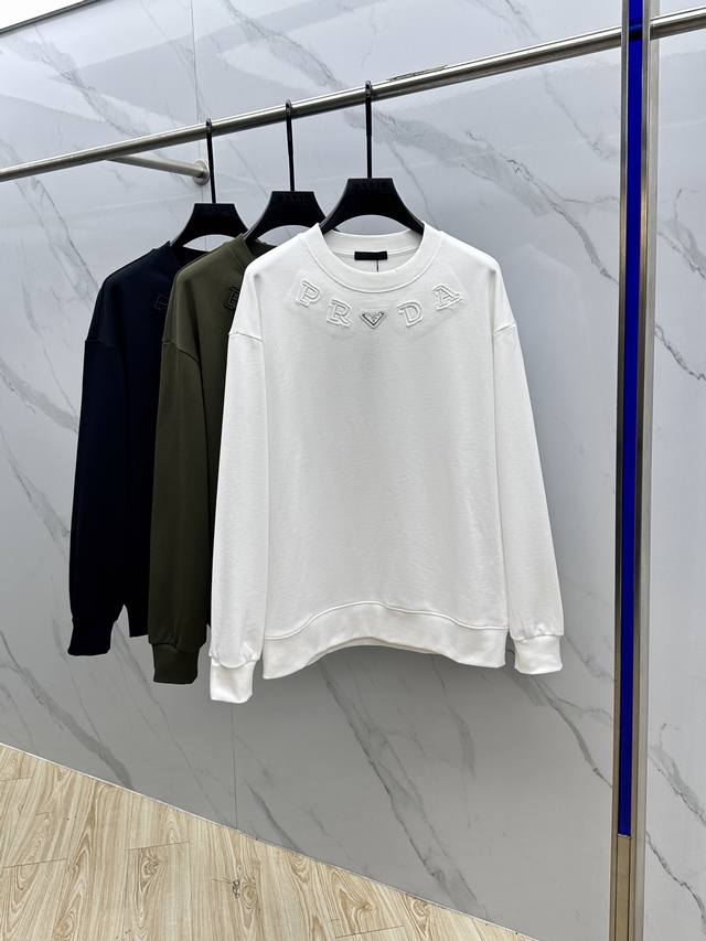 prada* Prada's new Fall/Winter 2025 collection, this logo-emblazoned crewneck sw
