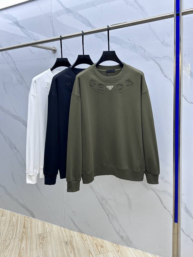 prada* Prada's new Fall/Winter 2025 collection, this logo-emblazoned crewneck sw