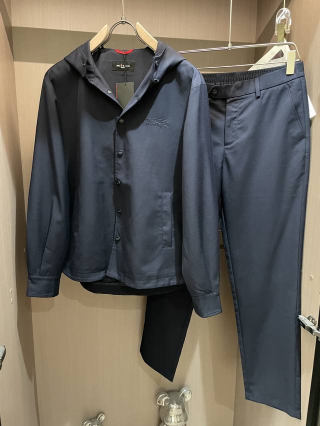 kiton This light grey hooded suit is the perfect style formula for the professio