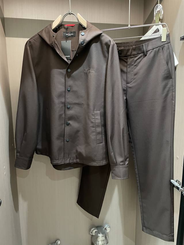 kiton This light grey hooded suit is the perfect style formula for the professio