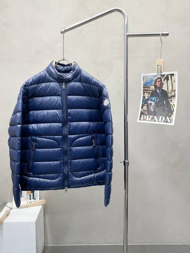 Down Jacket - Exclusively available from Moncler, this new classic down jacket