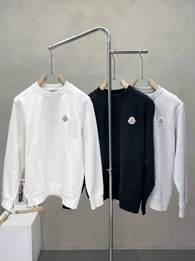 Exclusively from Moncler, this stylish pullover features a classic design and s