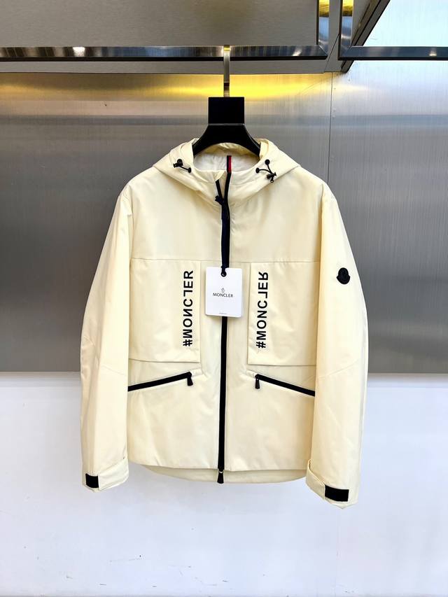 Mon's new autumn/winter hooded windbreaker jacket showcases minimalist elegance.
