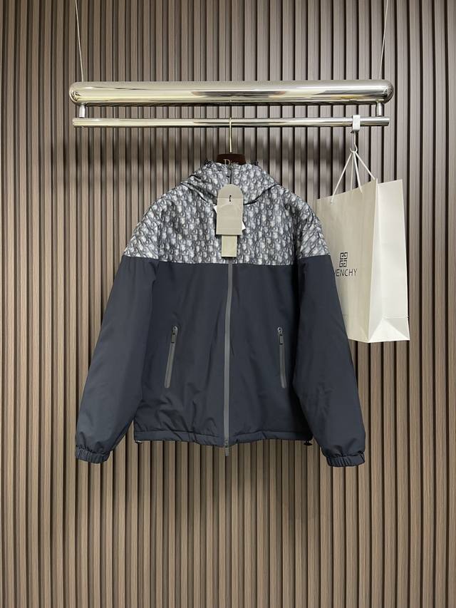 Dior's new 2025 hooded patchwork jacket pays homage to Dior's iconic Oblique pri