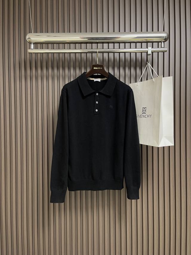 Burberry's knitted polo with an embroidered warhorse collar features cashmere as