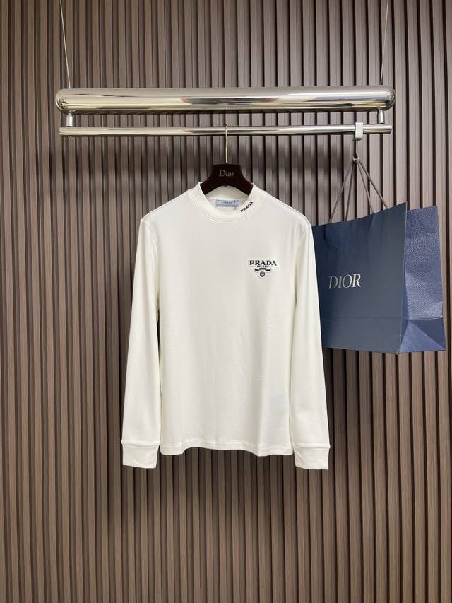 This Prada logo-embroidered round-neck long-sleeved T-shirt is made from high-q