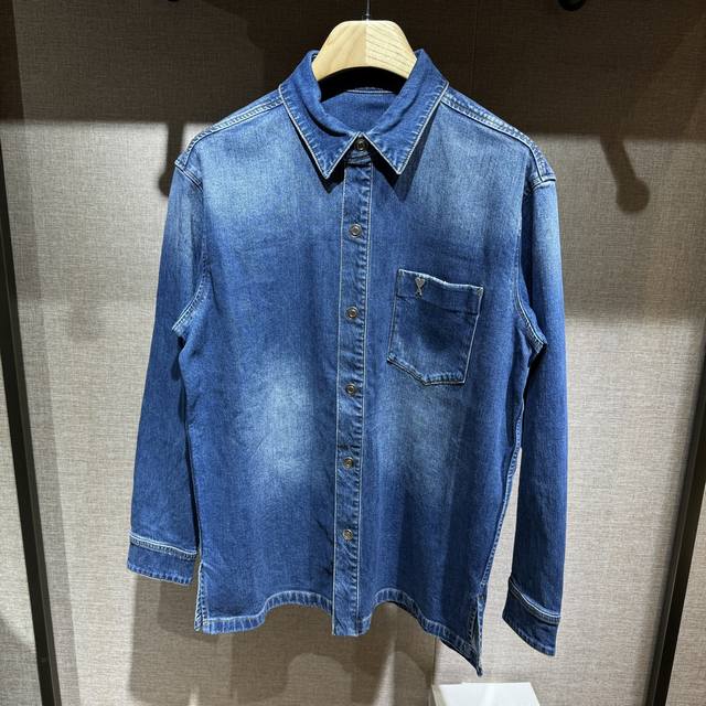 : the fashionable Ami loose-fit washed and distressed denim jacket. This well-ma