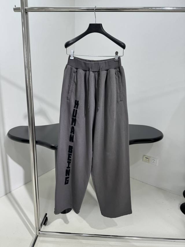 New Human Being Shifted track pants. Made from custom-dyed jersey. Straight-leg
