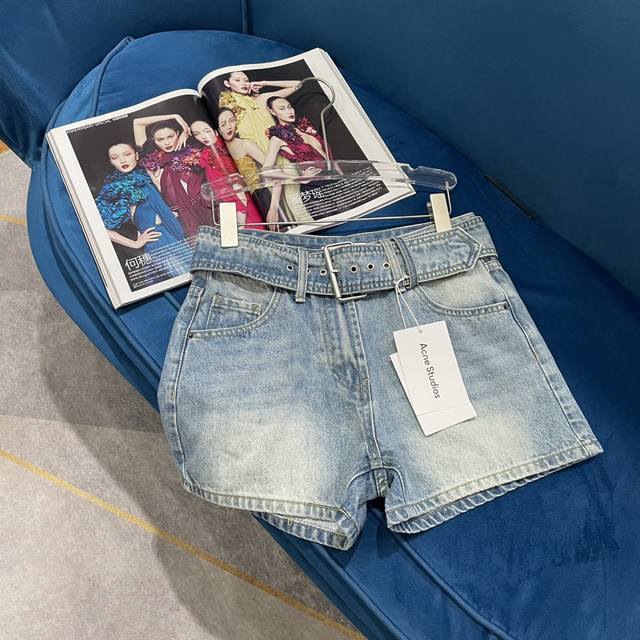 Acne Studio* denim shorts with a belt and logo. Made from siro-spun fabric, thes