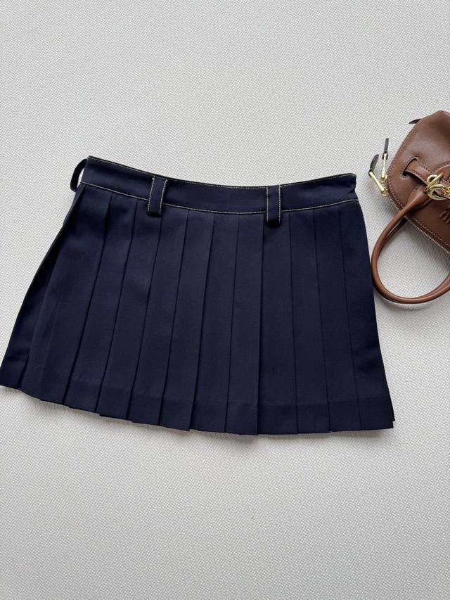 Miumi* 25Ss Early Fall new preppy-style navy blue and gold-stitched pleated skir