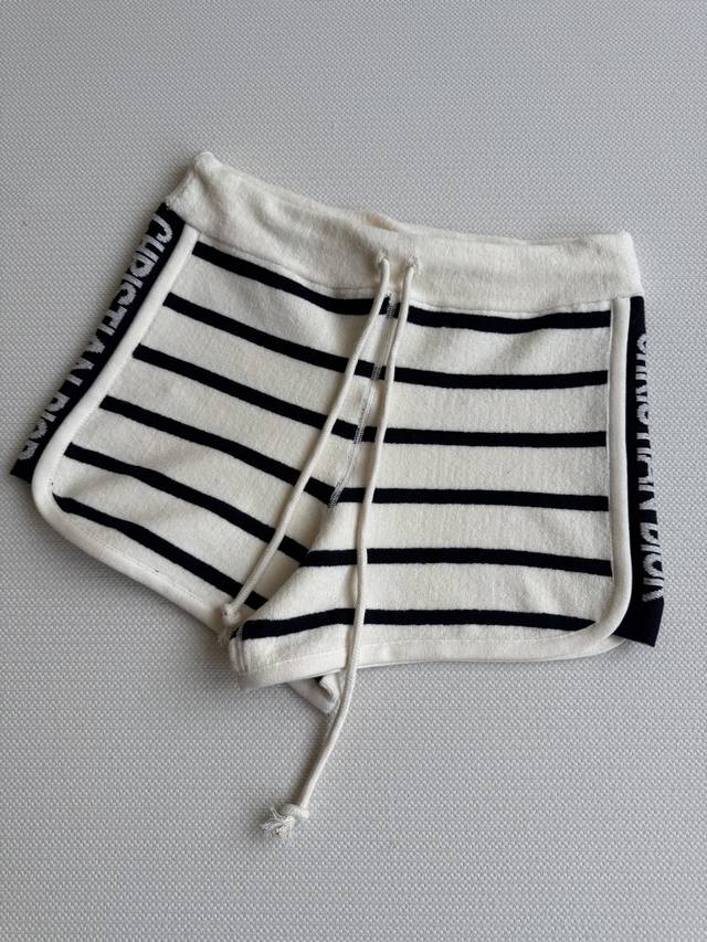 Dio*25's new early fall collection features drawstring striped shorts, a must-ha