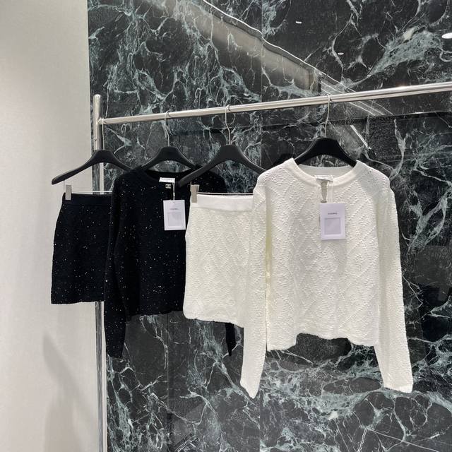 A set of Chanel's new early fall 2025 knitted top and skirt set featuring a sli