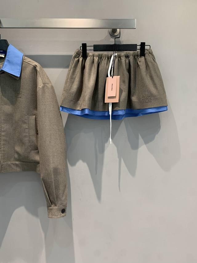 Originally developed by Miumi*, this 2025 early fall faux two-piece lace-up woo