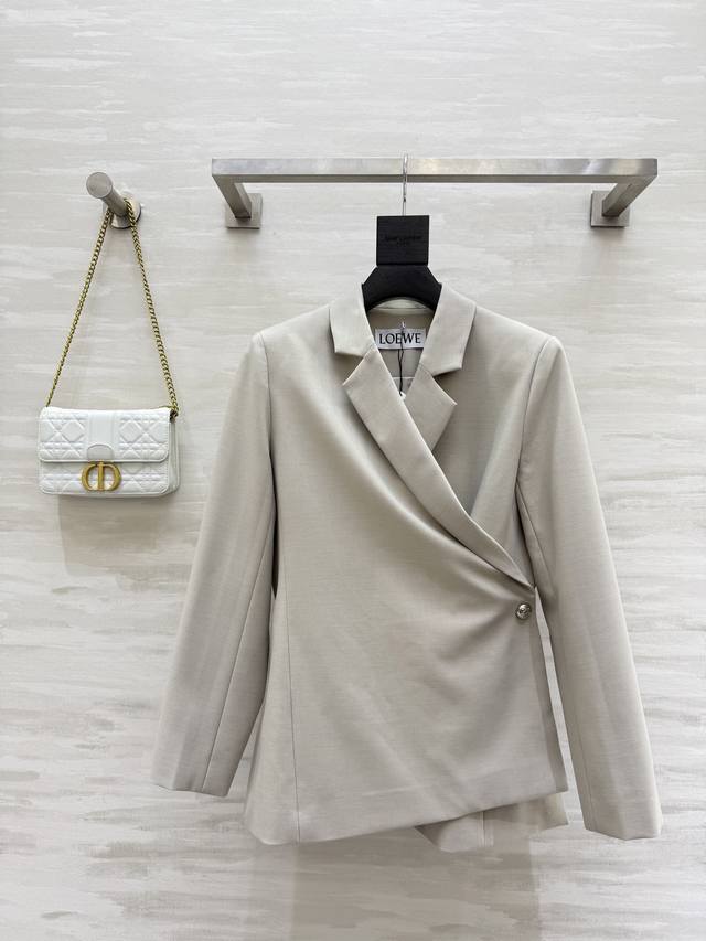 Loew2's new fall/winter single-button slim-fit jacket with a waist. Cut from lig