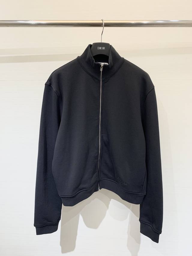 Acnestudios Autumn/Winter 25 collection. Long-sleeved cardigan with washed, dist