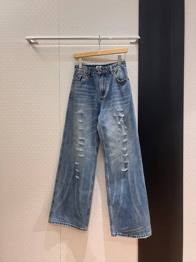New style runway style washed ripped denim wide-leg pants with hand-sewn leathe