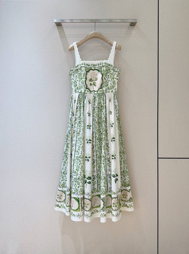 Agua By Agua Bendi*T*A's new dress features a pure white base, adorned with fres