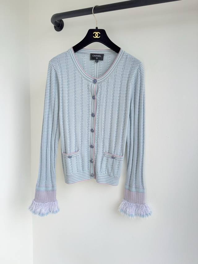 Chane25's new autumn resort collection features a long-sleeved cardigan knitted