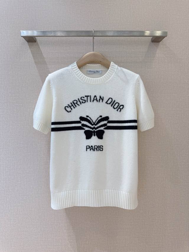 D's 25th Summer Collection: High-End Fashion. This sweater is elegant and stylis