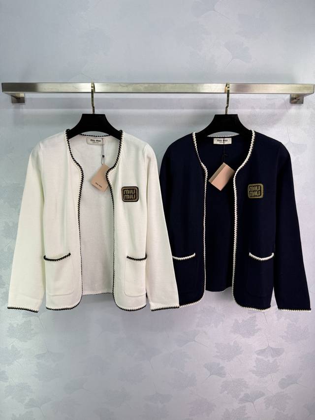 Miu Chanel-style knitted cardigan, available in white and navy blue, features a