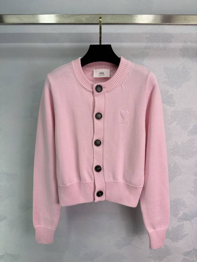 Ami*25 Early Fall new mid-length knitted cardigan with heart-shaped details. Ava